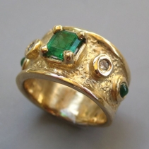 Emerald and Diamonds in 14kt Gold Wide Band