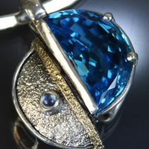 Blue Topaz Sterling Silver and 14kt Gold Pendant