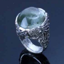 Quartz with Inclusions and Dolphin Carved in SS Octopus Ring