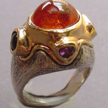 Spessartite Garnet in Sterling Silver and 14kt Gold Ring with Black Star Sapphires and Brown Diamonds